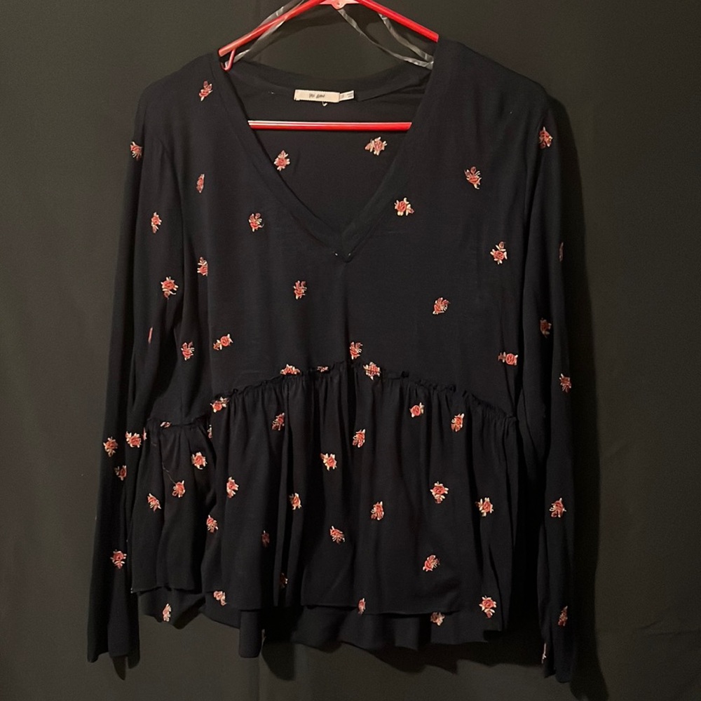 Navy blue long sleve shirt with pink flowers.